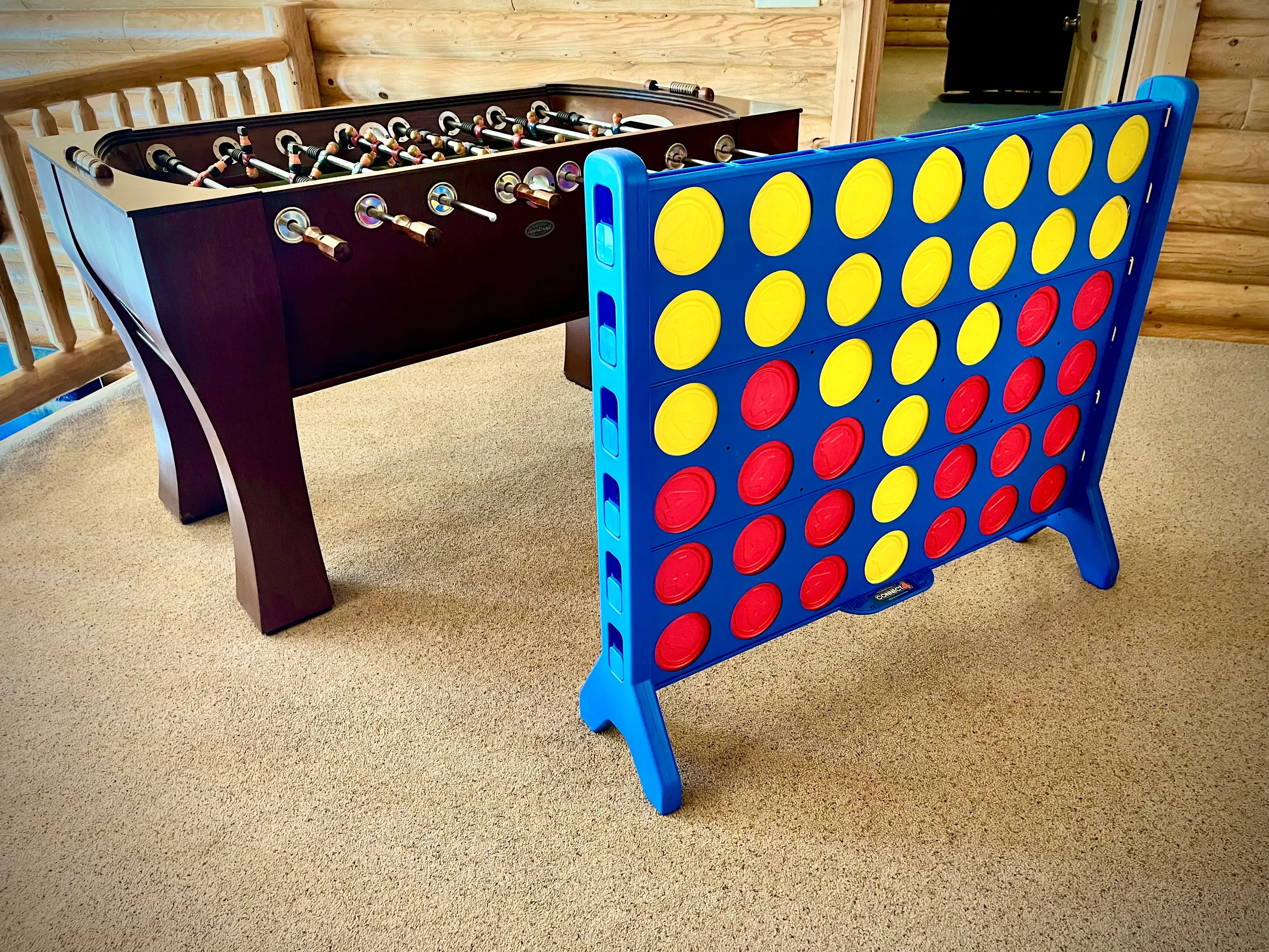 Foosball table, arcade game, and life-size Connect 4