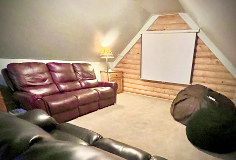 Supersize bean bag and big projector screen with Roku