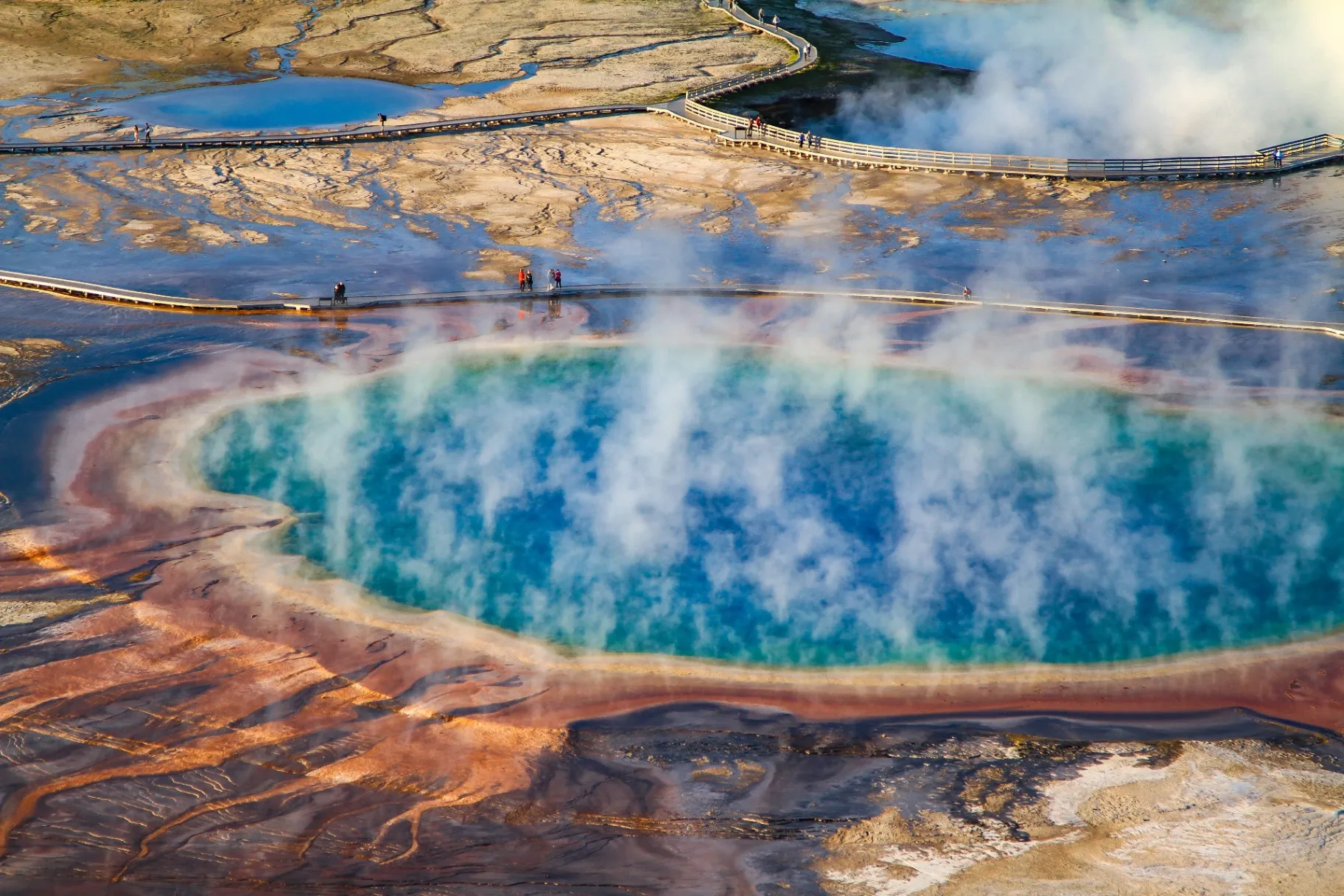 Aerial view of Grand Prismatic Spring showing vivid rainbow colors