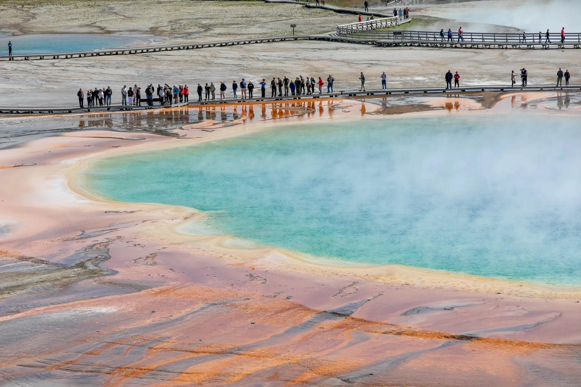 Aerial view of Grand Prismatic Spring's vivid rainbow colors from the overlook trail