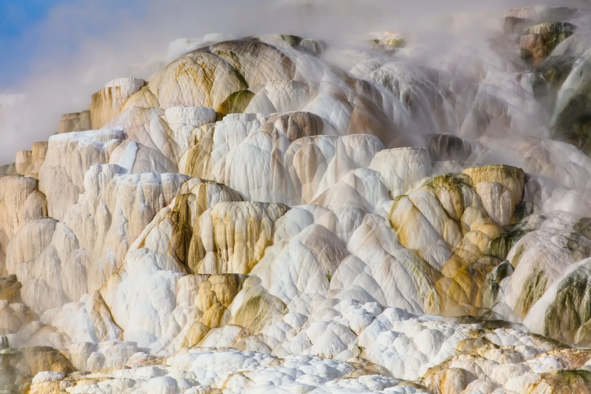 Mammoth Hot Springs terraces with white and orange mineral deposits