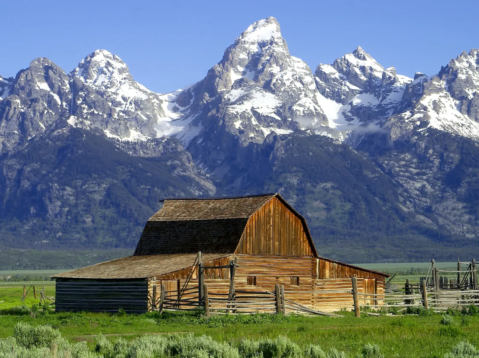 Barn at Mormon Row with Grand Teton mountains in background