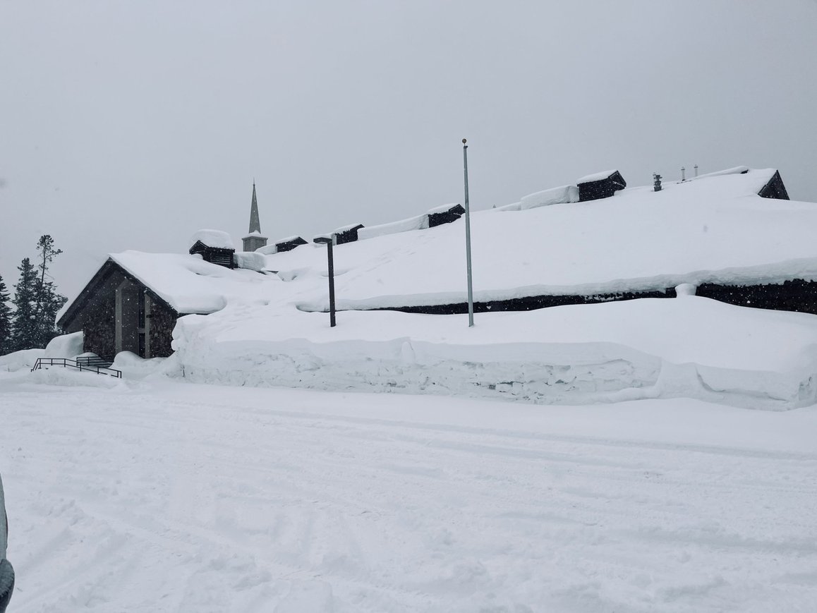 Church in Island Park with very high snow banks